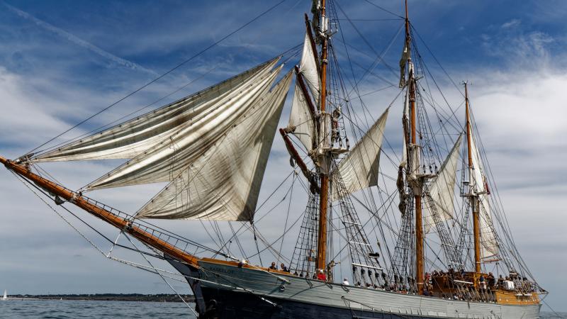  sailboat sailing on sea against sky - stock photo - Eprevier Deodat/ Getty Images