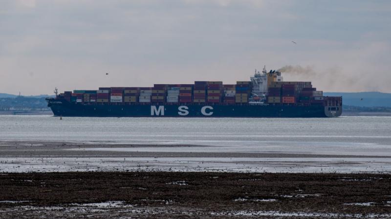 Cargo Ship sails off the coast of England