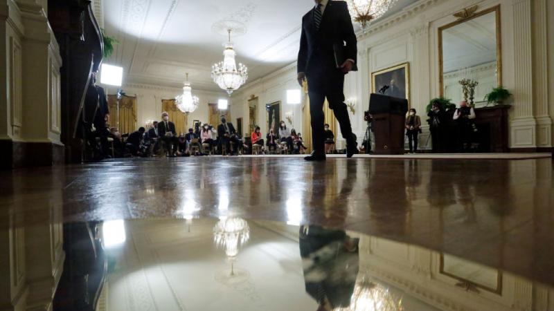 Biden at a press conference, Mar. 25