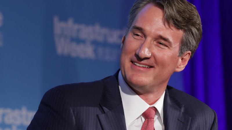 Glenn Youngkin tals at a pannel in 2017