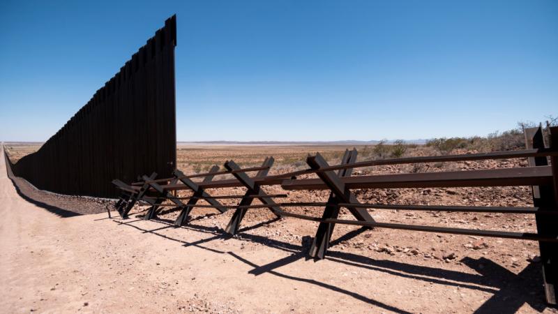 Fencing fills a gap in the border wall on the Johnson Ranch near Columbus, N.M.