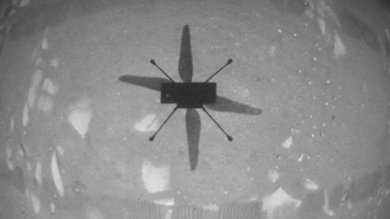 NASA’s Ingenuity Mars Helicopter took this shot while hovering over the Martian surface on April 19, 2021