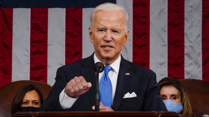 U.S. President Joe Biden addresses a joint session of Congress as Vice President Kamala Harris (L) and Speaker of the House U.S. Rep. Nancy Pelosi (D-CA) (R) look on in the House chamber of the U.S. Capitol April 28, 2021 in Washington, DC.