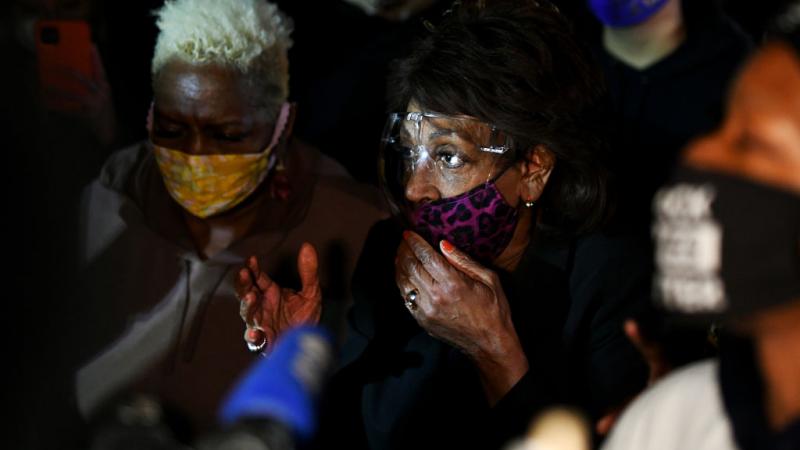 Rep. Maxine Waters joins demonstrators outside Brooklyn Center police station on April 17, 2021 in Minnesota