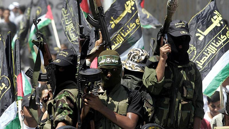 Islamic Jihad militants march