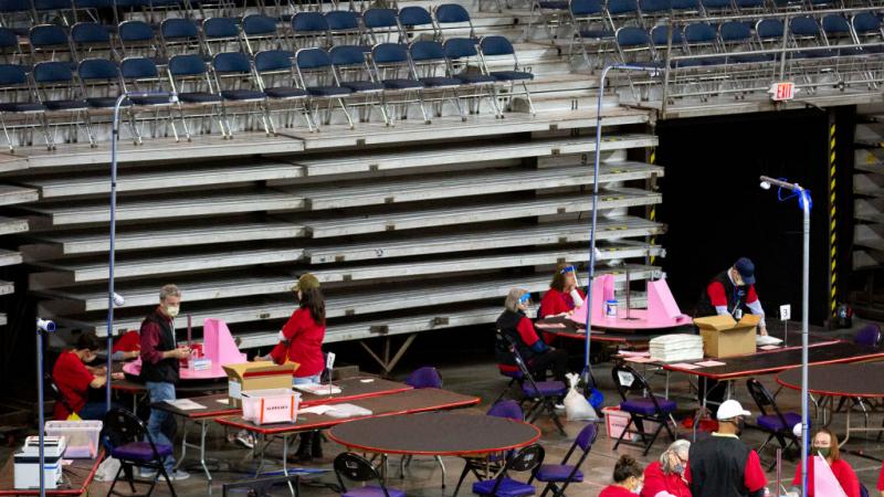 Audit workers in Phoenix, Az., May 1