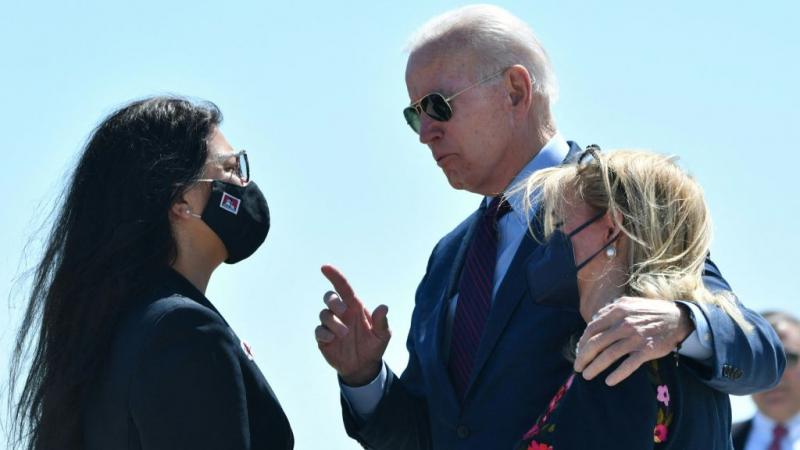President Joe Biden with his arm around Rep. Debbie Dingell as he talks to Rep. Rashida Tlaib on May 18, 2021
