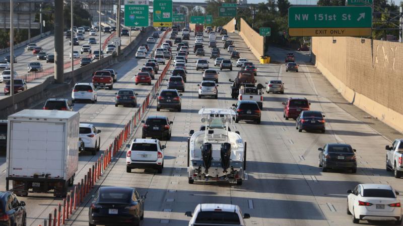 Travelers on I-95 in Miami, Fl., May 27
