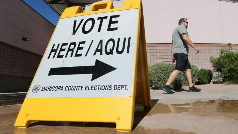 Arizona voters head to polling place in Phoenix in 2018