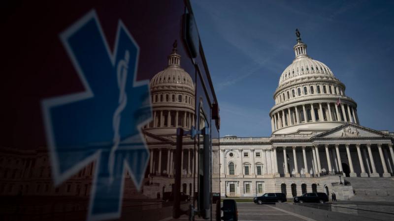 Ambulance parked on the plaza outside the U.S. Capitol in 2020