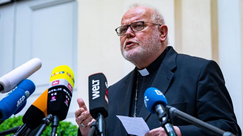 Cardinal Reinhard Marx talks to the press at press conference 