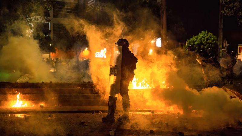 An anti-riot policeman seen during clashes in Colombia