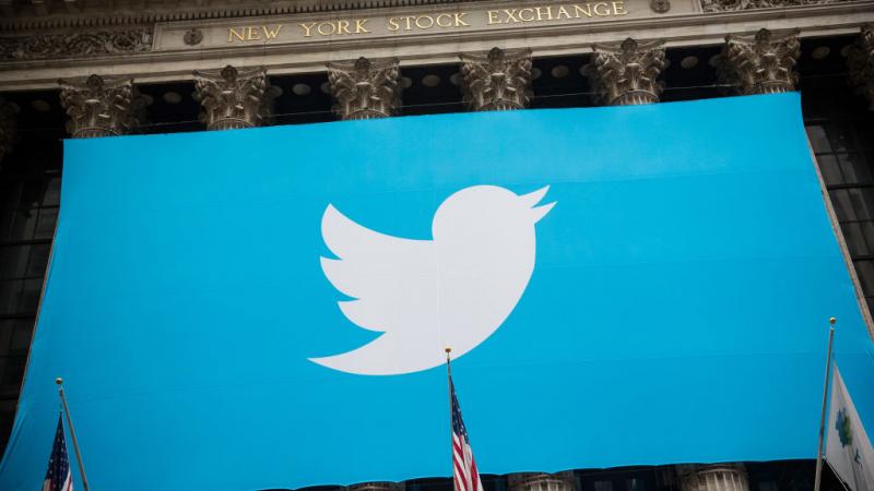 Twitter logo outside NYSE in 2013