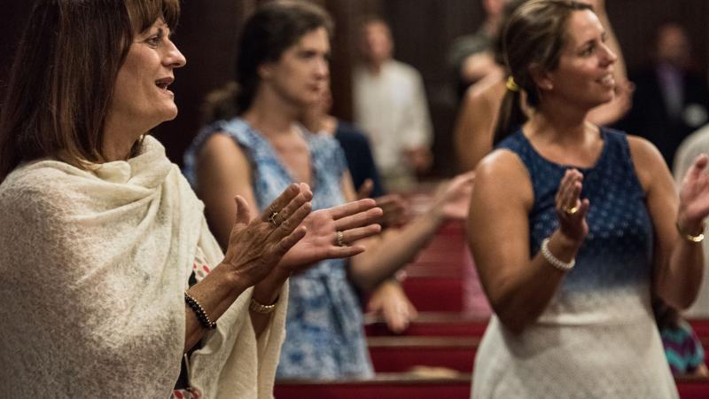 Sandy Tecklenburg, wife of Charleston Mayor John Tecklenburg, sings during a memorial service remembering the victims of the mass shooting at Emanuel African Methodist Episcopal (AME) Church, June 17, 2016 in Charleston, South Carolina.