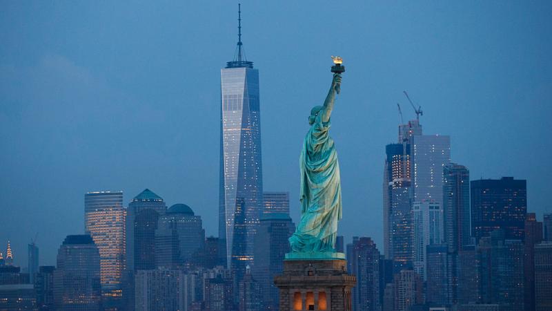 Statue of Liberty with Lower Manhattan in background in 2016