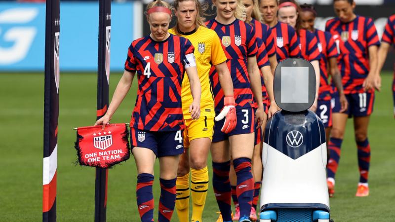  Becky Sauerbrunn #4 of the United States leads the team out before the game on July 5