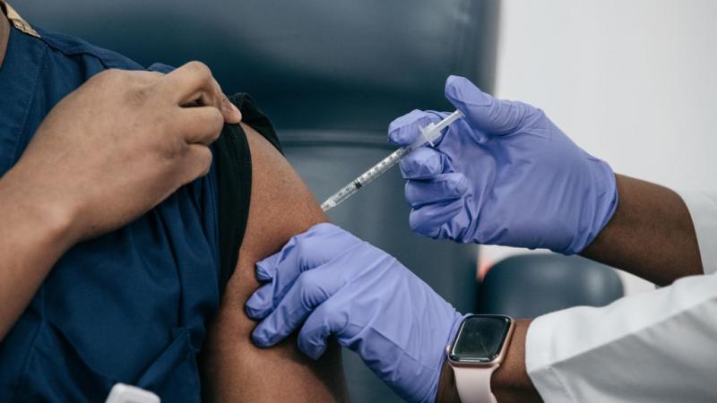 Administering a COVID-19 vaccine