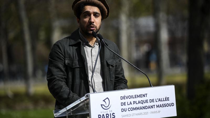 Ahmad Massoud, son of late Afghan commander Ahmad Shah Massoud, delivers a speech during a ceremony to unveil a commemorative plaque in honour of late Afghan anti-Taliban commander Massoud in an alley along the Champs-Elysees Avenue in Paris on March 27, 2021.