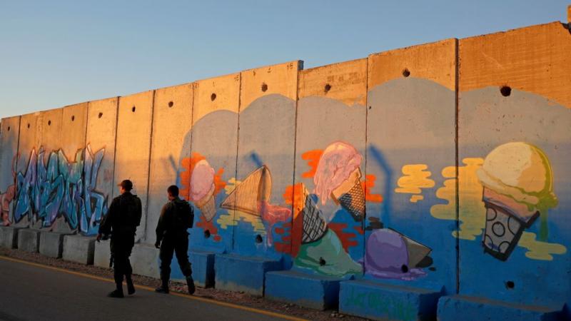 Israeli soldiers patrol the northern border with Lebanon near the Israeli settlement of Shtula 