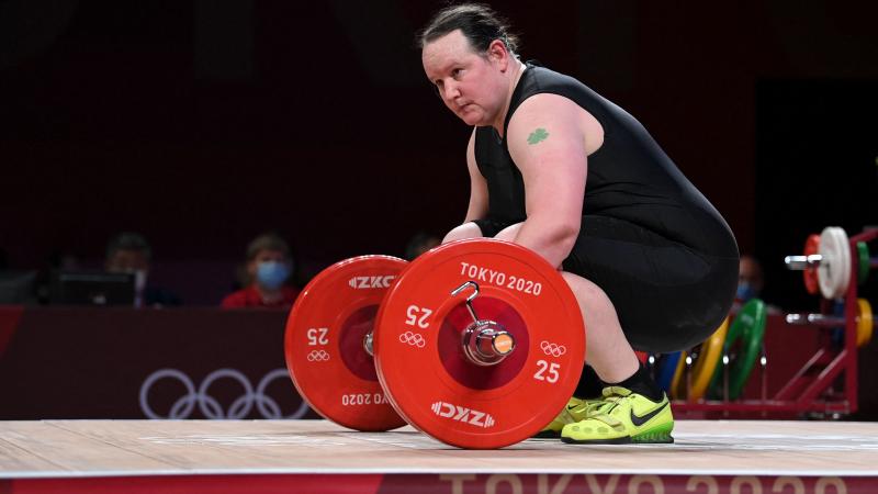New Zealand's Laurel Hubbard reacts in the women's +87kg weightlifting competition during the Tokyo 2020 Olympic Games at the Tokyo International Forum in Tokyo on August 2, 2021.