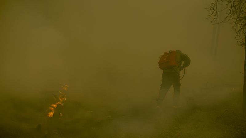 Extinguishing works continue for the wildfire in the village of Kuel in Yakutia, Sakha, Russia on August 08, 2021.