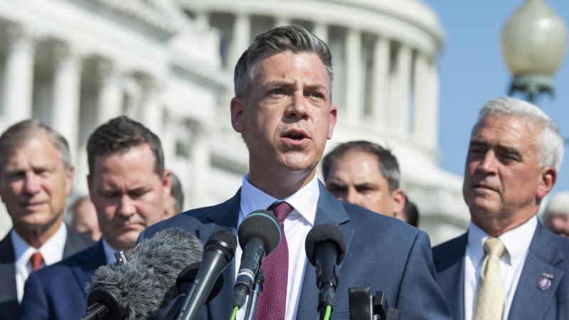 Rep. Jim Banks, R-Ind., a Navy Reserve officer who served in Afghanistan, speaks during a news conference to discuss the U.S. military withdrawal from the country, with members fo the House Republican Conference outside the U.S. Capitol on Tuesday, August 24, 2021.