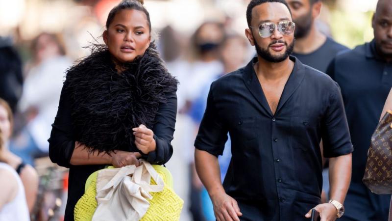 Chrissy Teigen (L) and John Legend are seen in SoHo on July 30, 2021 in New York City