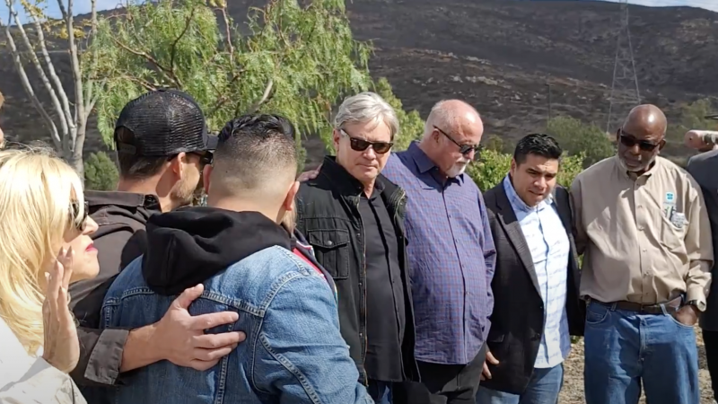 Pastors praying at border