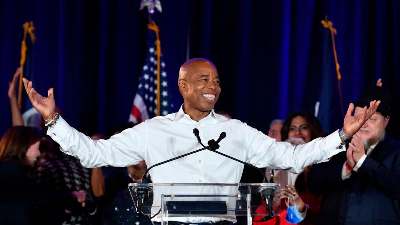 New York City Democratic Mayor-elect Eric Adams gestures to supporters during his 2021 election victory night party at the Brooklyn Marriott on November 2, 2021 in New York City.