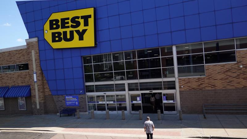Customers shop at a Best Buy store on August 24, 2021 in Chicago, Illinois.