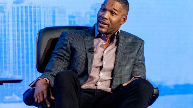 Michael Strahan on stage Daymond John interviews him during the 2021 Black Entrepreneurs Day at The Apollo Theater on October 06, 2021 in New York City.