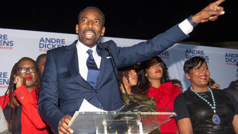 Mayor-elect Andre Dickens speaks on stage during the Atlanta mayor runoff watch party