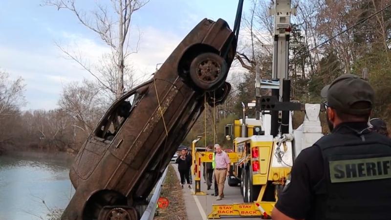The discovered car being removed from the Calfkiller River