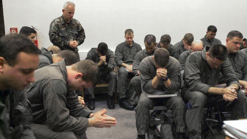 A U.S. Air Force Chaplain Leads Crewmembers Of A C-17 Globemaster Iii In Prayer Before A Mission October 18, 2001 Near Northern Afghanistan.