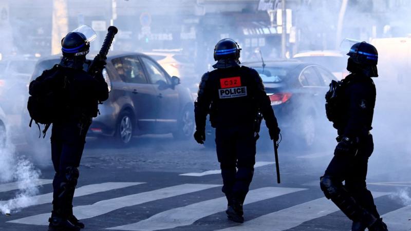 French police deploy teargas against protesters in Paris, Feb. 12