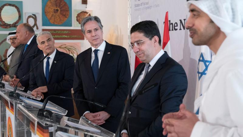 United Arab Emirates Foreign Minister Sheikh Abdullah bin Zayed Al Nahyan, right, speaks with from left, Bahrains Foreign Minister Abdullatif bin Rashid al-Zayani, Egypts Foreign Minister Sameh Shoukry, Israels Foreign Minister Yair Lapid, US Secretary of State Antony Blinken, and Moroccos Foreign Minister Nasser Bourita, March 28, 2022, Sde Boker, Israel