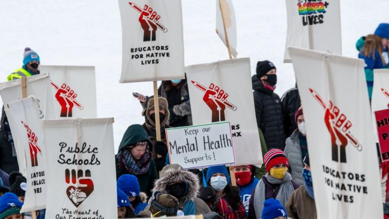Teachers rally and march for better contracts in St. Paul, Minnesota