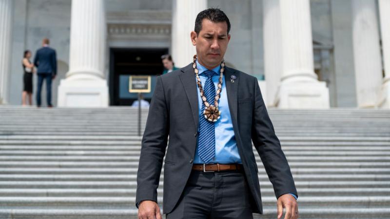 Kai Kahele, D-Hawaii, walks down the House steps