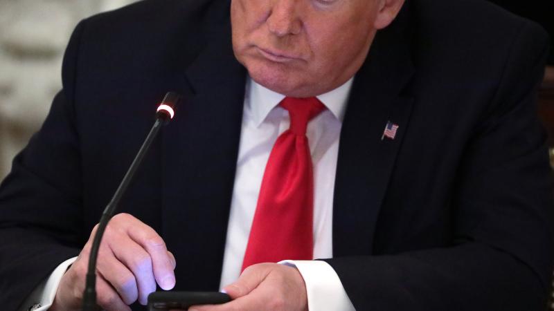 Donald Trump, phone, Washington, D.C., June 18, 2020