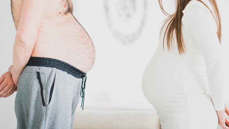 Pregnant man and woman
