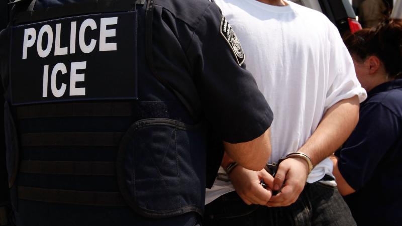 Immigration and Customs Enforcement (ICE) arrests illegal immigrant, Chicago, May 25, 2010