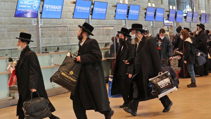 Orthodox Jewish passengers, Ben Gurion Airport, Israel, Dec. 21, 2021