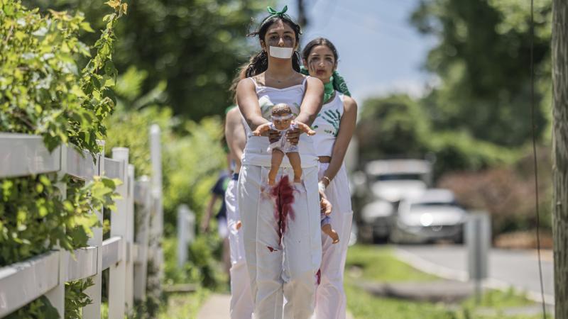 Pro-abortion protestors march to Amy Coney Barrett's home, June 18, 2022, Falls Church, Va.
