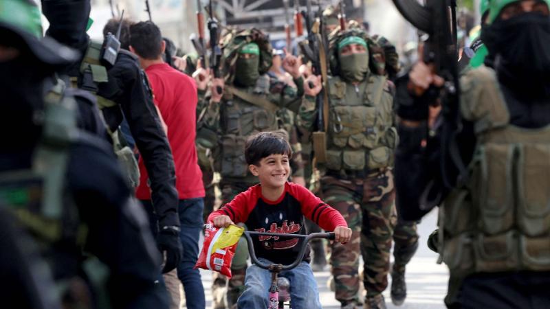 Child on bike, Hamas, Gaza, May 22, 2021