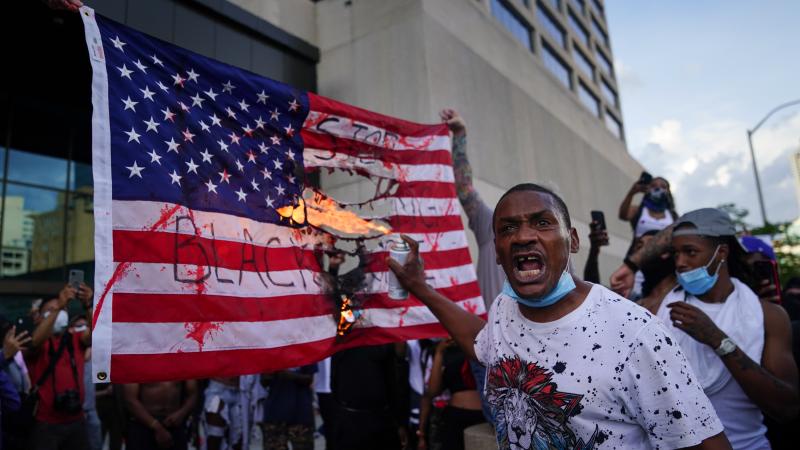Burning American flag, Atlanta, Ga., May 29, 2020