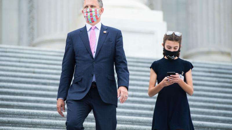 U.S. Rep. Sean Casten leaves Capitol with Daughter