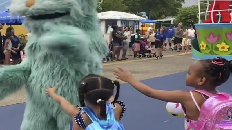 Critics claim the video shows a Sesame Street actor snubbing two black children