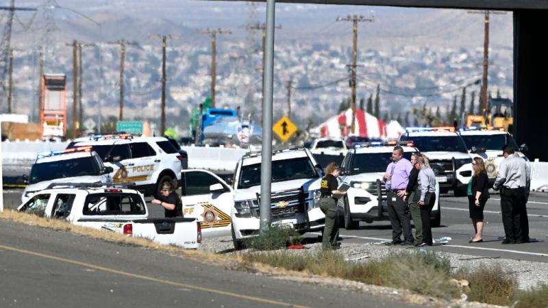 Police at the scene of the shootout in Victorville, Calif., Sept. 27
