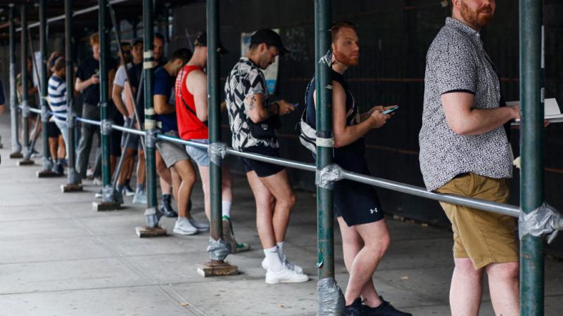 New York City residents wait in line for the monkeypox vaccine, July 2022