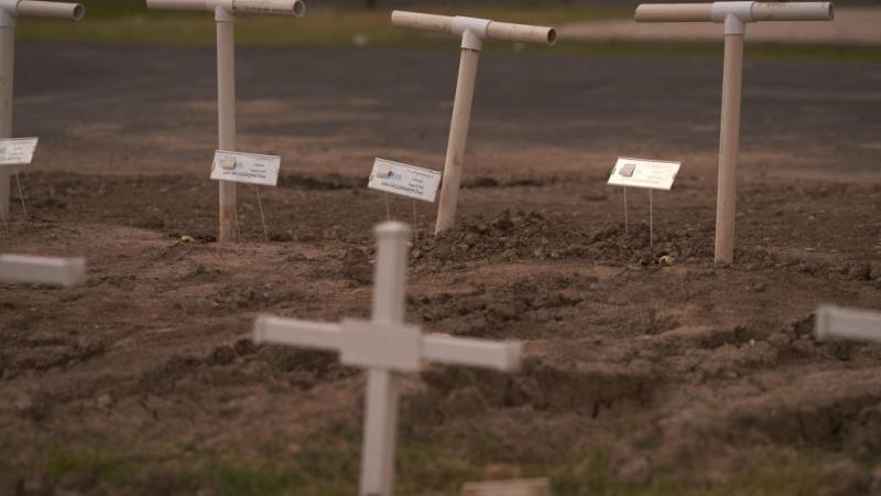 Grave sites of deceased migrants who were not able to be identified are seen at the Maverick County Cemetery on October 9, 2022 in Eagle Pass, Texas